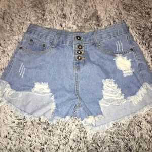 Mid rise denim distressed shorts